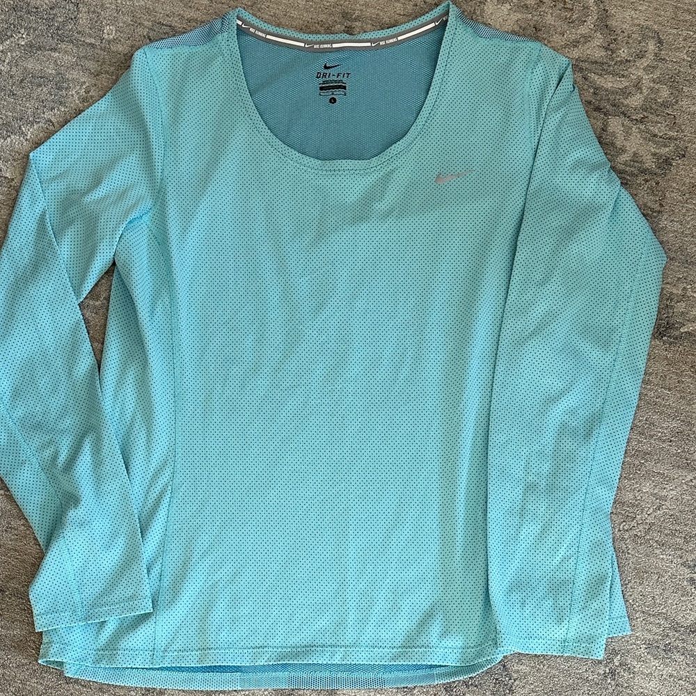 Nike women’s running shirt
Size L
Color light teal